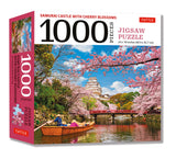 Samurai Castle with Cherry Blossoms 1000 Piece Jigsaw Puzzle: Cherry Blossoms at Himeji Castle (Finished Size 24 in X 18 in) Tuttle Publishing