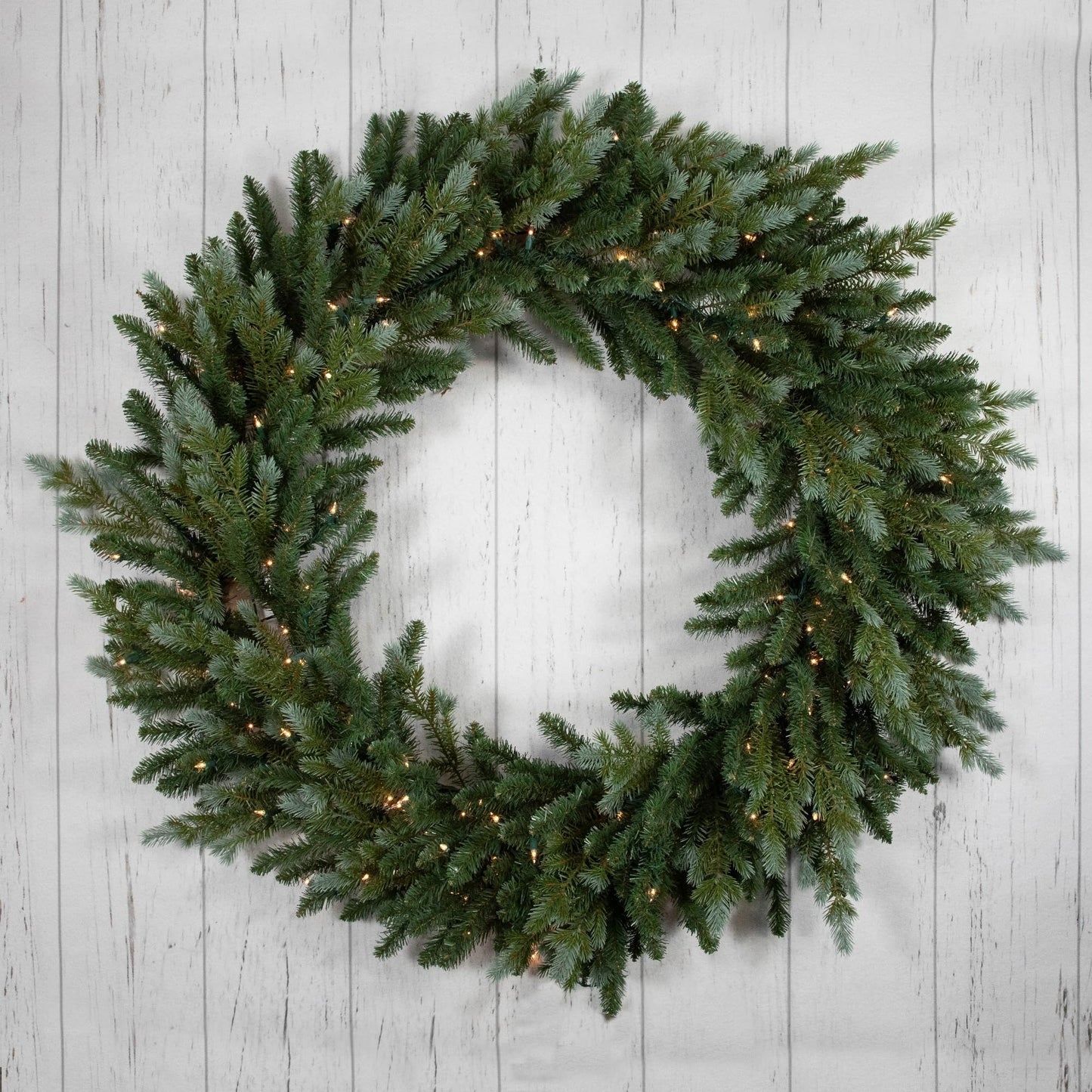 Northlight Pre-Lit Blue Spruce Artificial Christmas Wreath Clear Lights, 48", Green