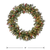 National Tree Company Pre-Lit Artificial Christmas Wreath, Green, Crestwood Spruce, White Lights, Decorated with Pine Cones, Berry Clusters, Frosted Branches, Christmas Collection, 36 Inches National Tree Company