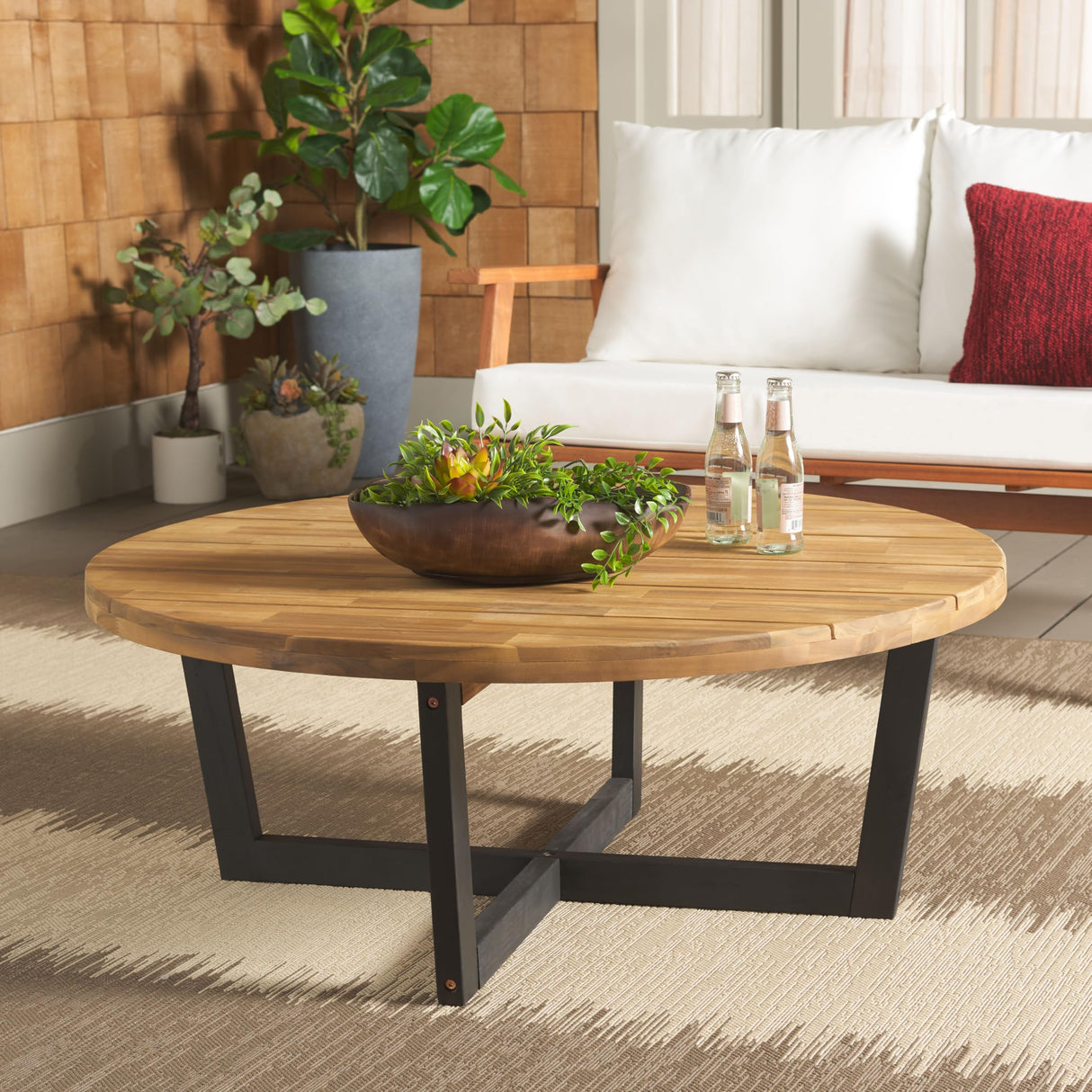 SAFAVIEH Outdoor Collection Leo Natural/Black 4-Leg Round Coffee Table, Ideal for Deck, Patio, Backyard, Sunroom SAFAVIEH