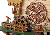 Trenkle Quartz Cuckoo Clock Black Forest House with Moving Black Forest Woman and Mill Wheel, with Music TU 4215 QM Trenkle