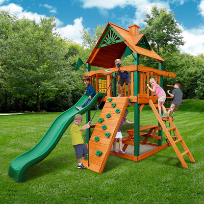 Gorilla Playsets 01-0061-AP-1 Chateau Tower Wooden Playset with Amber Posts, Slide, Climbing Wall, & Deluxe Green Vinyl Canopy - WoodArtSupply