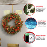 National Tree Company Pre-Lit Artificial Christmas Wreath, Green, Evergreen, White Lights, Decorated with Ball Ornaments, Red Sprigs, Christmas Collection, 24 Inches National Tree Company