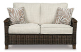 Signature Design by Ashley Paradise Trail Outdoor Loveseat with All Weather Cushions, Medium Brown Signature Design by Ashley