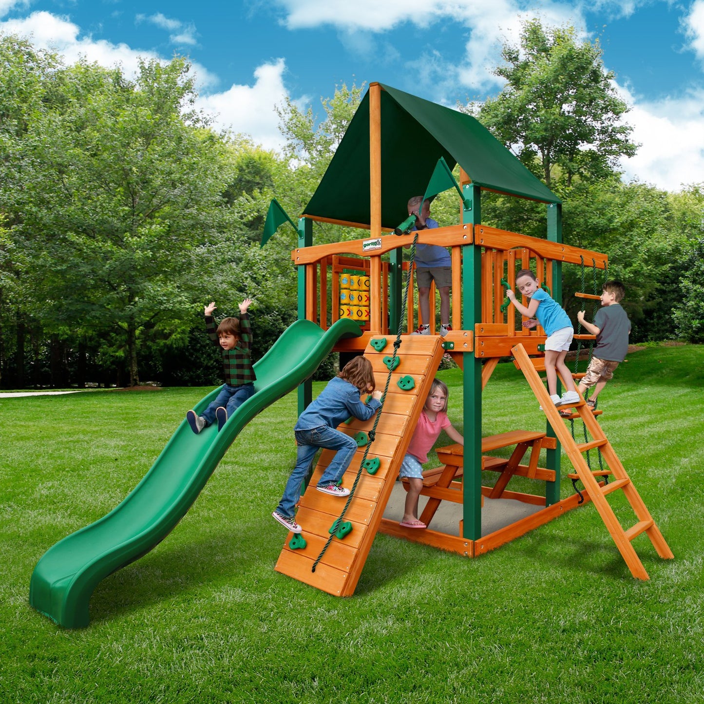 Gorilla Playsets 01-0061-AP-1 Chateau Tower Wooden Playset with Amber Posts, Slide, Climbing Wall, & Deluxe Green Vinyl Canopy - WoodArtSupply