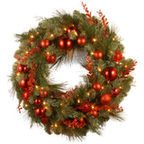 National Tree Company Pre-Lit Artificial Christmas Wreath, Green, Evergreen, White Lights, Decorated with Ball Ornaments, Red Sprigs, Christmas Collection, 24 Inches National Tree Company