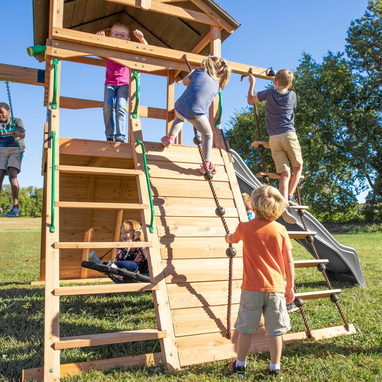 Backyard Discovery Endeavor All Cedar Wood Swing Set Playset with Gray Wave Slide for Backyard with Large Clubhouse Rope Ladder Rock Climbing Wall Wave Slide 2 Belt Swings and 1 Web Swing Gift