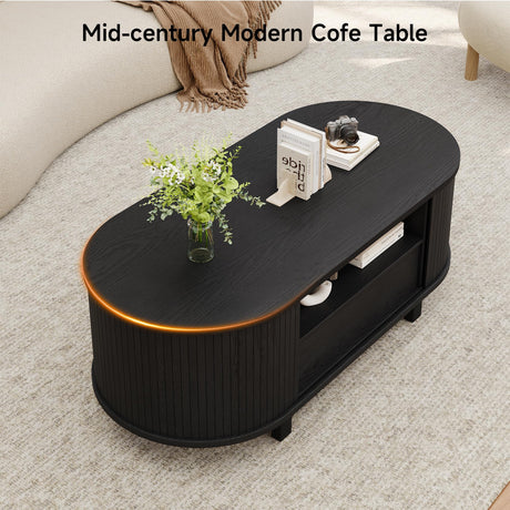 47 Inch Oval Coffee Table, Fluted Coffee Tables with Storage, Mid-Century Modern Living Room Tables, Center Table with Sliding Door and Wood Handle for Living Room, Black ComfyCorner