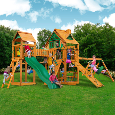 Gorilla Playsets 01-0055-AP Pioneer Peak Treehouse Wooden Swing Set with Amber Posts, Tire Swing, Slide and Tower with Clatter Bridge, Brown Gorilla Playsets