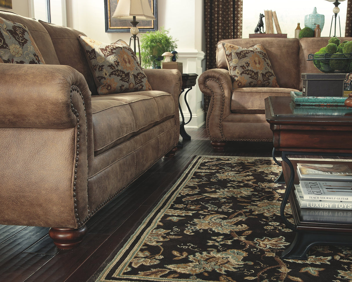 Signature Design by Ashley Larkinhurst Faux Leather Sofa with Nailhead Trim and 2 Accent Pillows, Brown Signature Design by Ashley