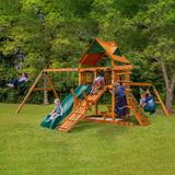 Gorilla Playsets 01-0004-AP Frontier Wood Swing Set with Wood Roof, Tire Swing, Two Belt Swings, Picnic Table, Sandbox, Rock Climbing Wall, Amber Gorilla Playsets