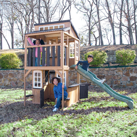 KidKraft Cliffbrook Wooden Outdoor Two-Story Playhouse with Slide KidKraft