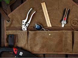 Ironwood Tool Co. 16oz Waxed Canvas Garden Tool Apron with shoulder pads, double stitched pocket, metal grommets for strap Ironwood Tool Company