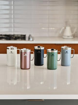 Stanley Stay Hot Camp Mug - Durable 18/8 Stainless Steel Insulated Mug - Splash-Free Tritan™ Drink-Thru Lid - 24 OZ - Cream Gloss STANLEY