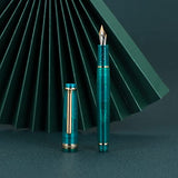 Jinhao 82 Acrylic Fountain Pen, Iridium Extra Fine Nib with Ink Converter, Transparent Peacock Blue Fluorescent Classic Design Smooth Writing Pen Wikult