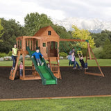 Backyard Discovery Hillcrest All Cedar Wooden Swing Set, Upper Covered Fort, Lower Playhouse, Picnic Area, Sandbox, Step Ladder, 10 ft Wave Slide, Backyard Discovery